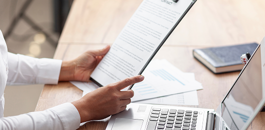 Document processing workflow combining paper forms and digital systems