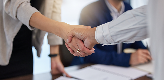 Image of people shaking hands