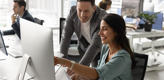 Professional mentor providing regulatory compliance guidance to colleague